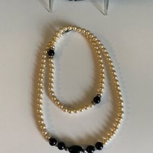 Pearl Necklace with Onyx Beads 31” long
15 1/2 folded length wise